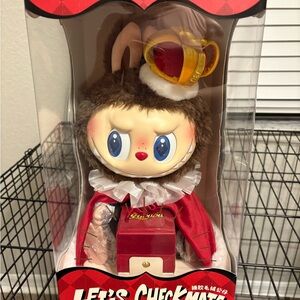 Cute Furry Figure with Crown and Red Outfit